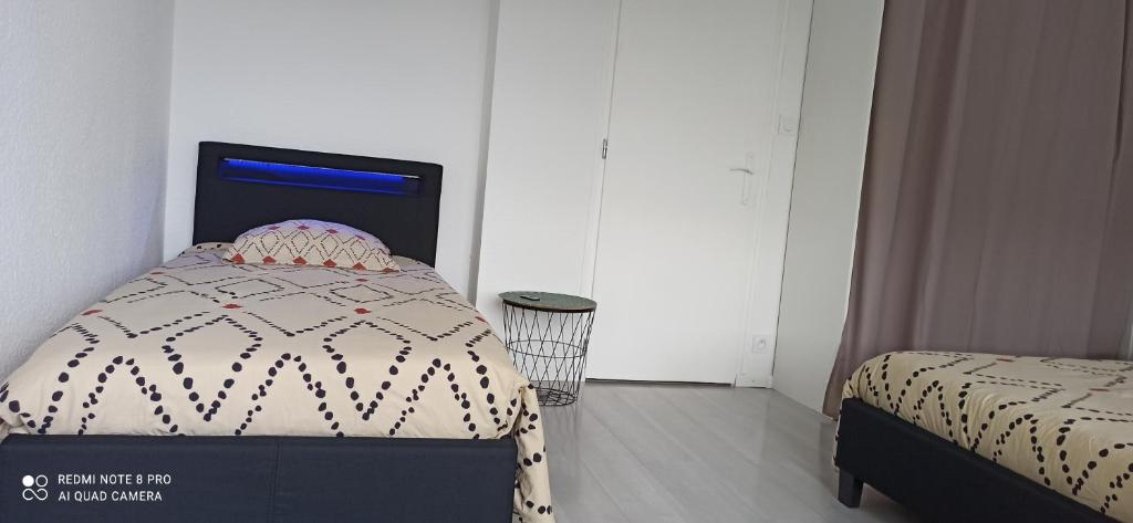 Postel nebo postele na pokoji v ubytování M & L