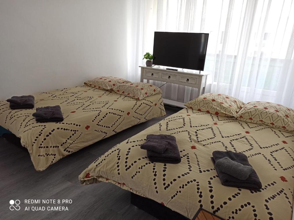 Postel nebo postele na pokoji v ubytování M & L