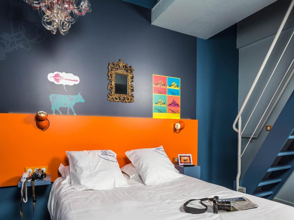 Postel nebo postele na pokoji v ubytování Hotel Gabriel
