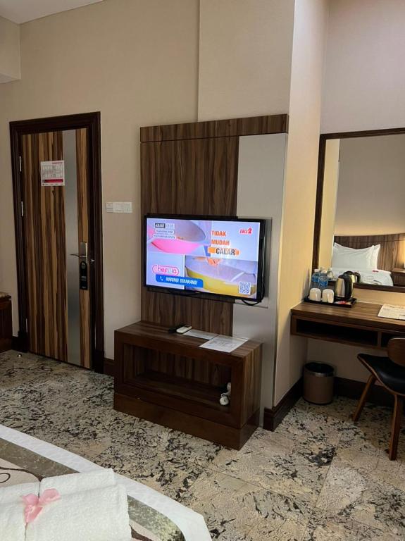 TV a/nebo společenská místnost v ubytování Nova Hotel Miri