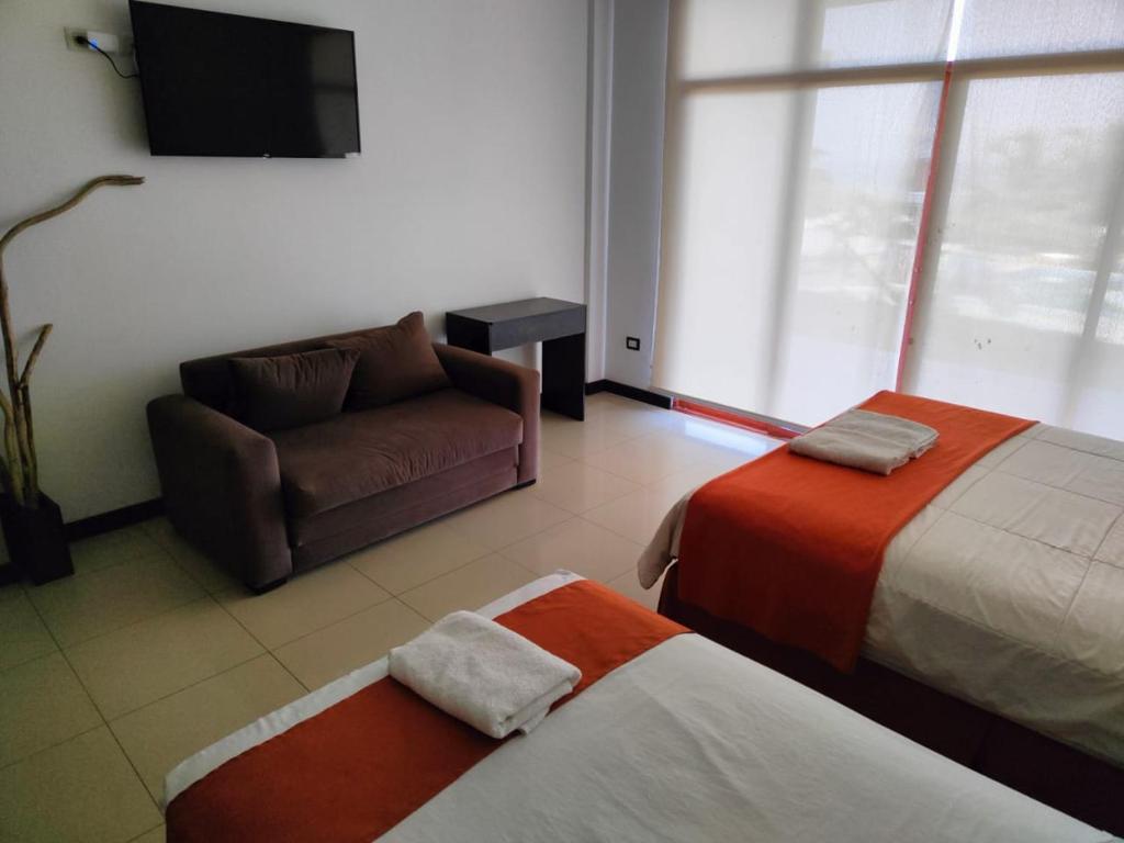Postel nebo postele na pokoji v ubytování Hotel Punta Azul