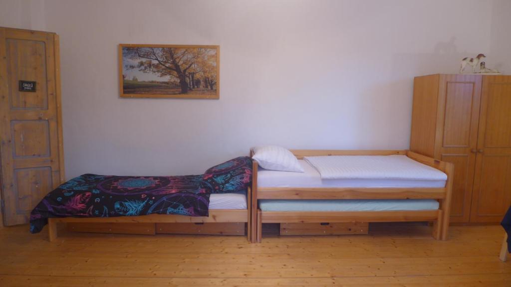 Postel nebo postele na pokoji v ubytování Statek Polánka