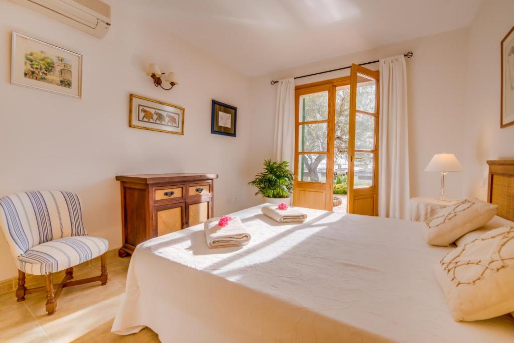 Postel nebo postele na pokoji v ubytování Ideal Property Mallorca - Blau Mari