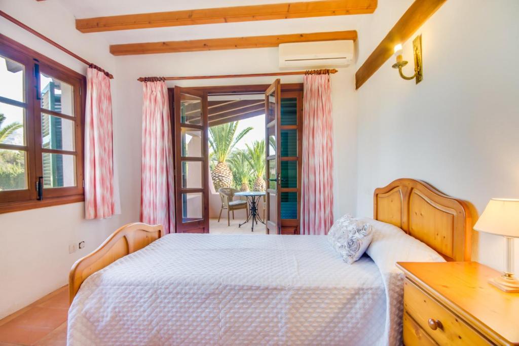 Postel nebo postele na pokoji v ubytování Ideal Property Mallorca - Can Comaro
