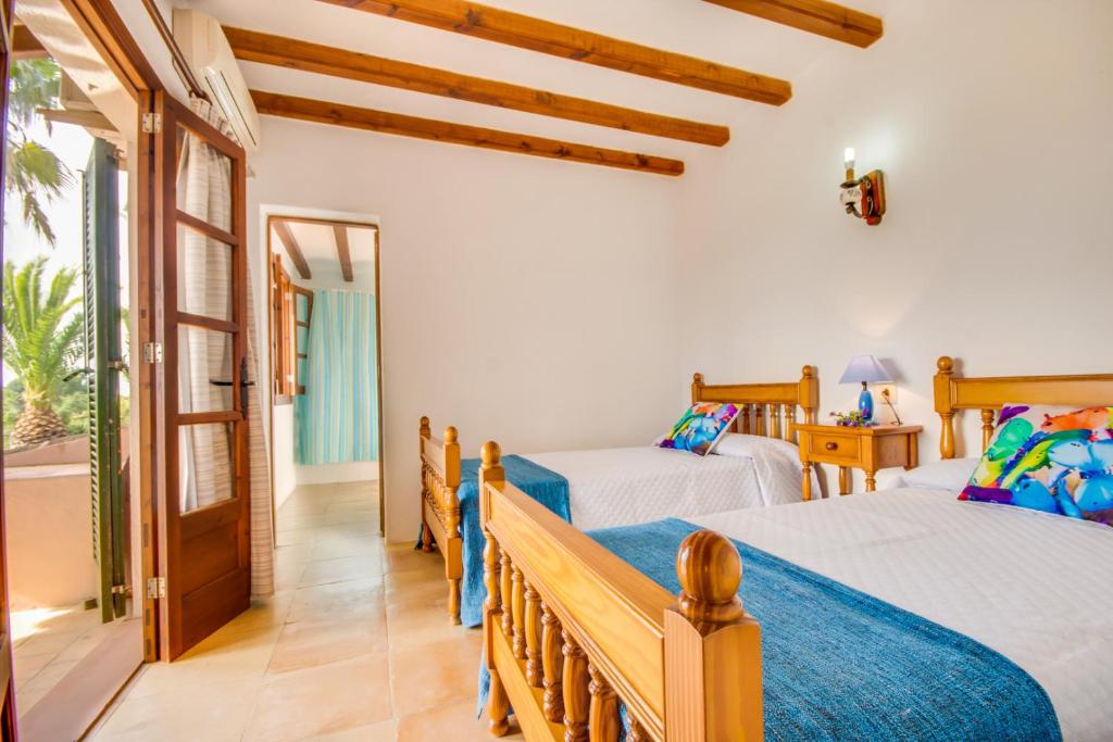 Postel nebo postele na pokoji v ubytování Ideal Property Mallorca - Can Comaro