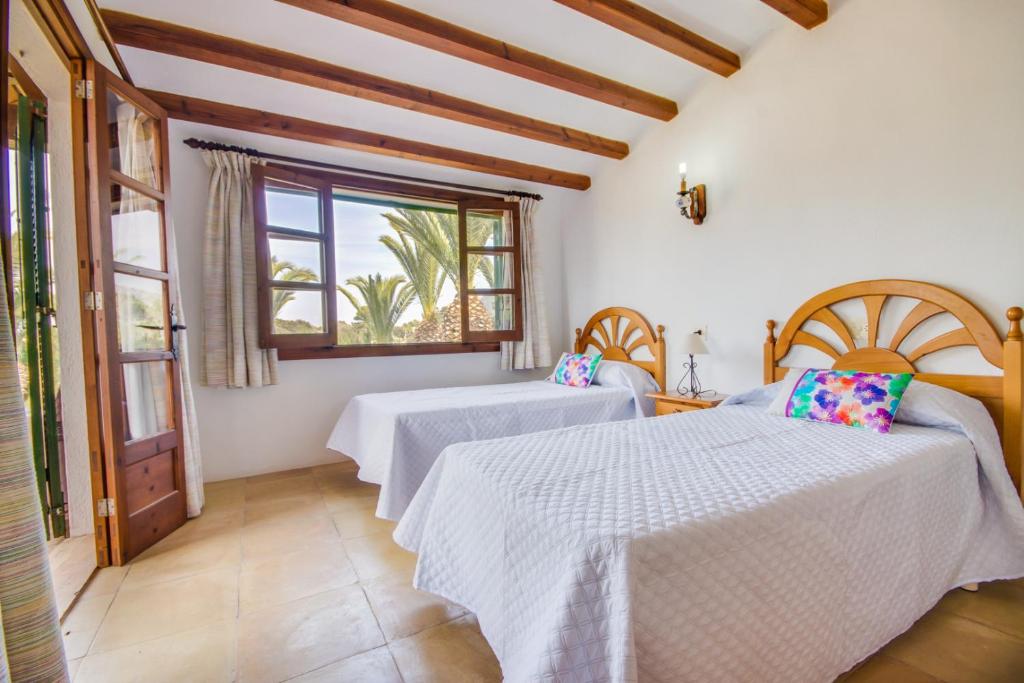 Postel nebo postele na pokoji v ubytování Ideal Property Mallorca - Can Comaro