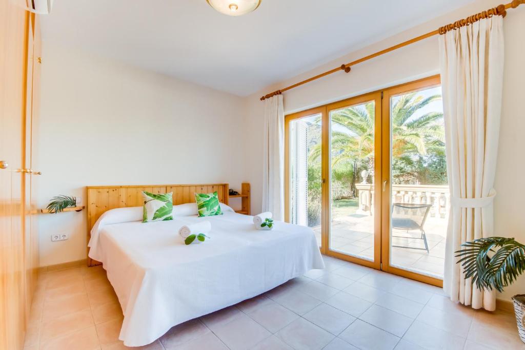 Postel nebo postele na pokoji v ubytování Ideal Property Mallorca - Aran Berna