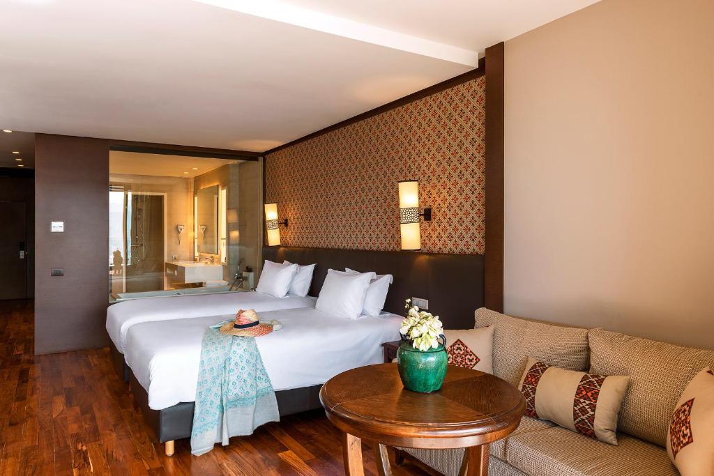 Een bed of bedden in een kamer bij Widiane Resort