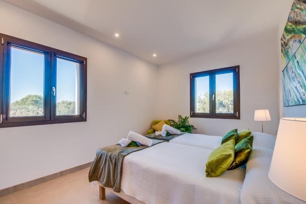 Postel nebo postele na pokoji v ubytování Ideal Property Mallorca - Sa Canova d'Ariany