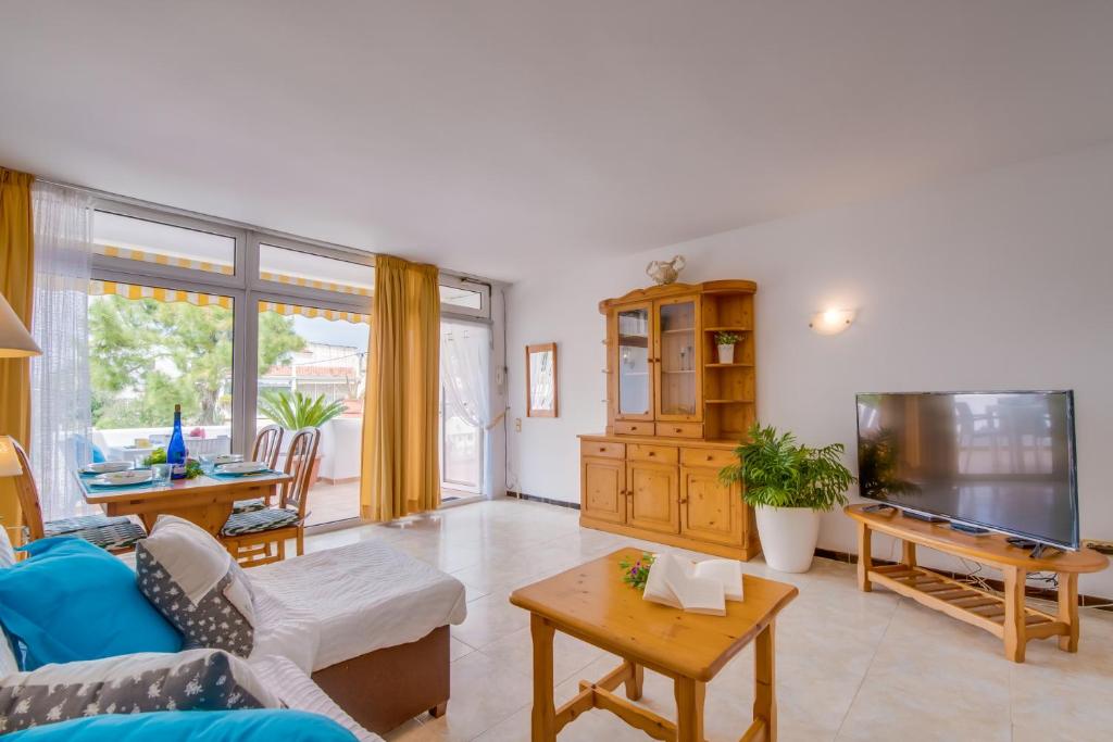 Televízia a/alebo spoločenská miestnosť v ubytovaní Ideal Property Mallorca - Silver