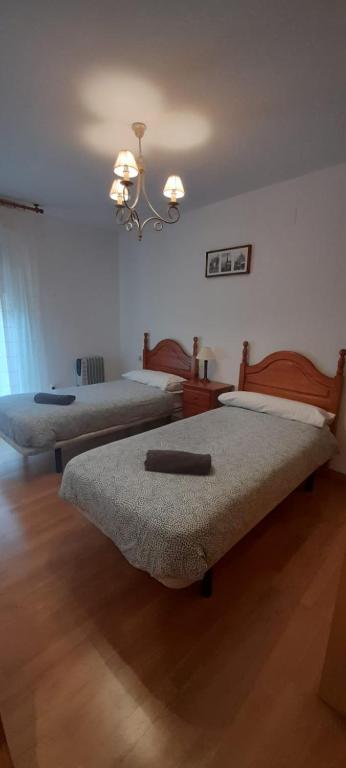 Postel nebo postele na pokoji v ubytování Buenavista