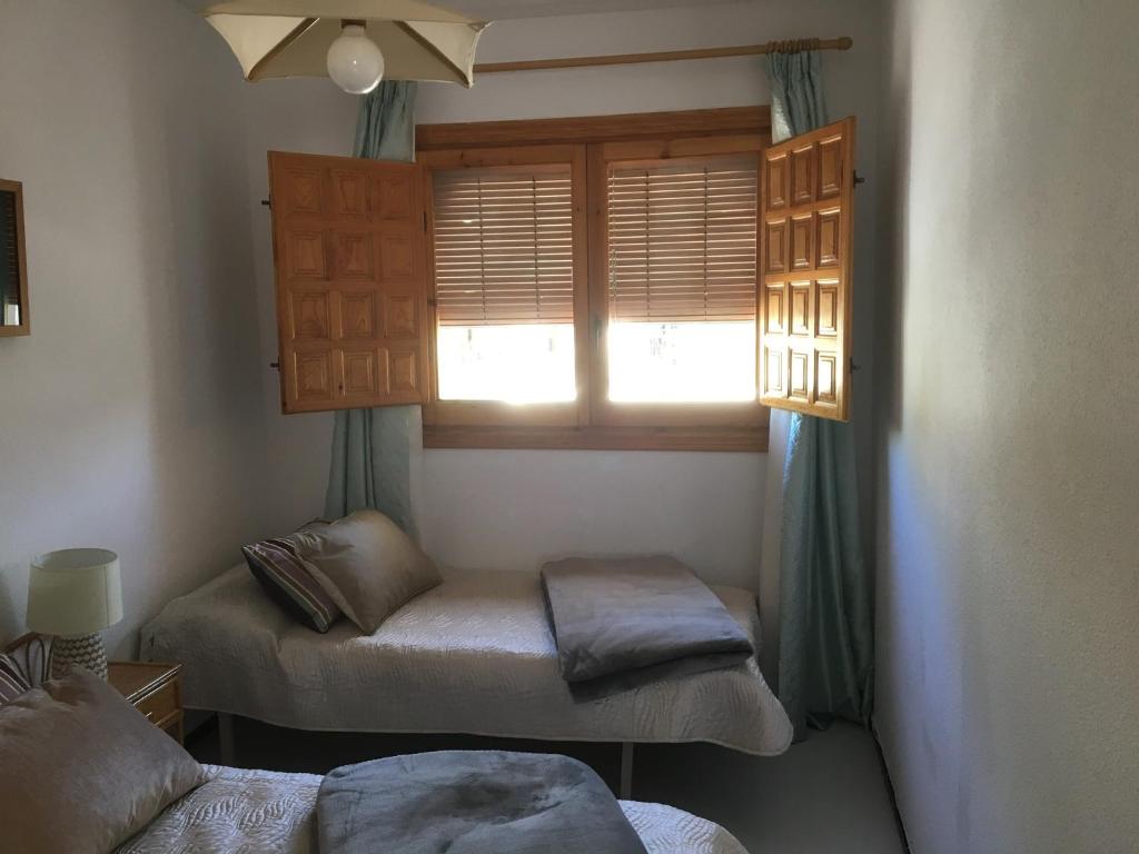 A bed or beds in a room at Costa Hispania