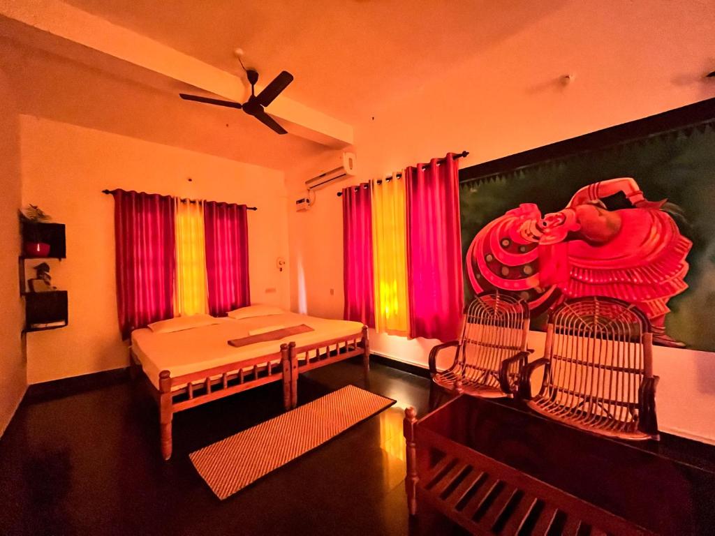 Postel nebo postele na pokoji v ubytování Indian Art Villa