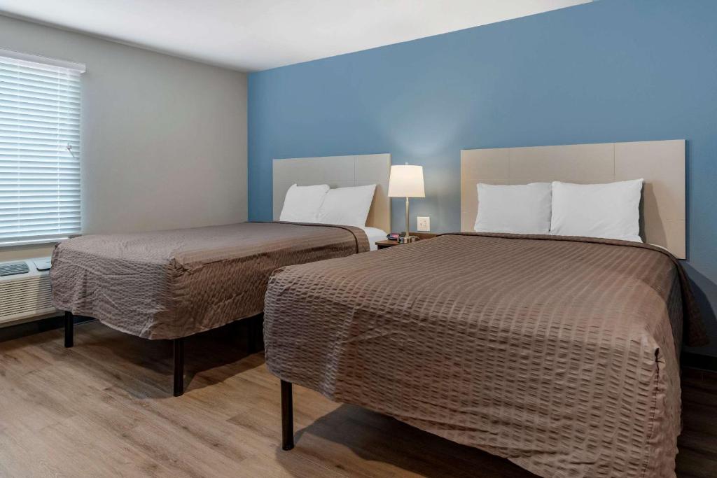 Postel nebo postele na pokoji v ubytování WoodSpring Suites Austin Georgetown