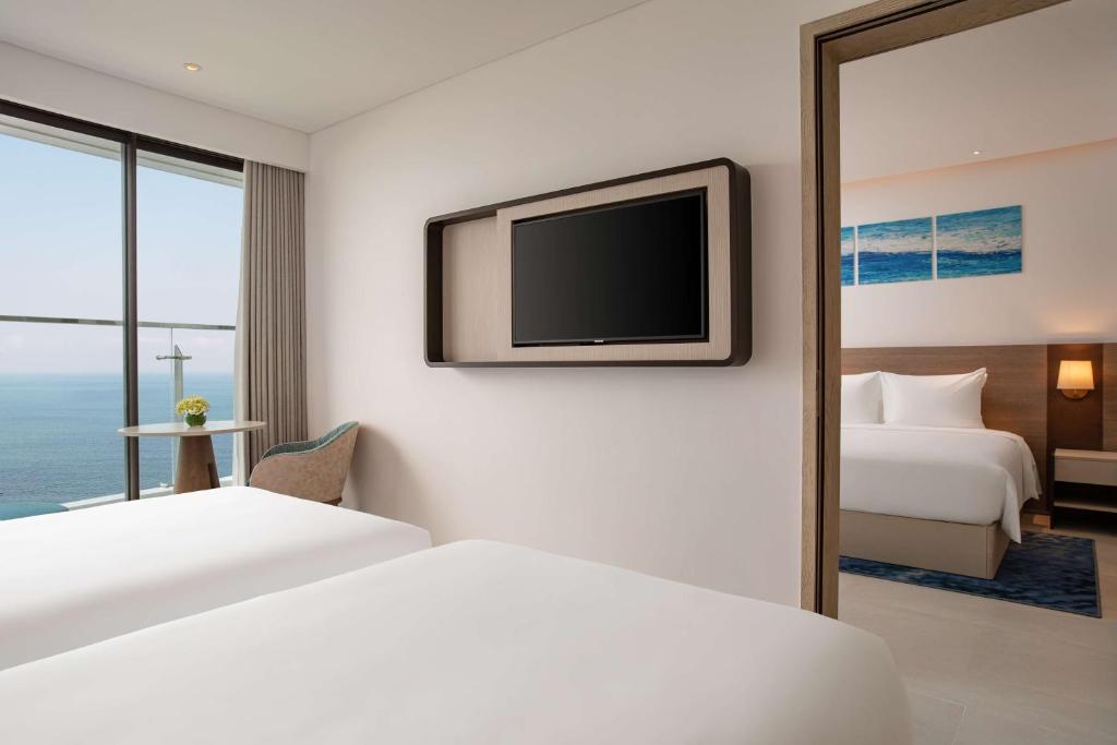 Postel nebo postele na pokoji v ubytování Radisson Hotel Danang