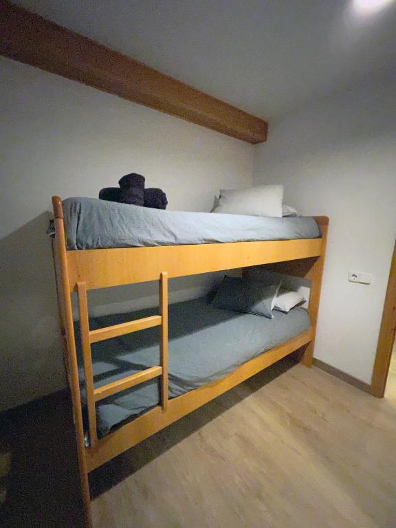 A bed or beds in a room at Apartaments Albiñana