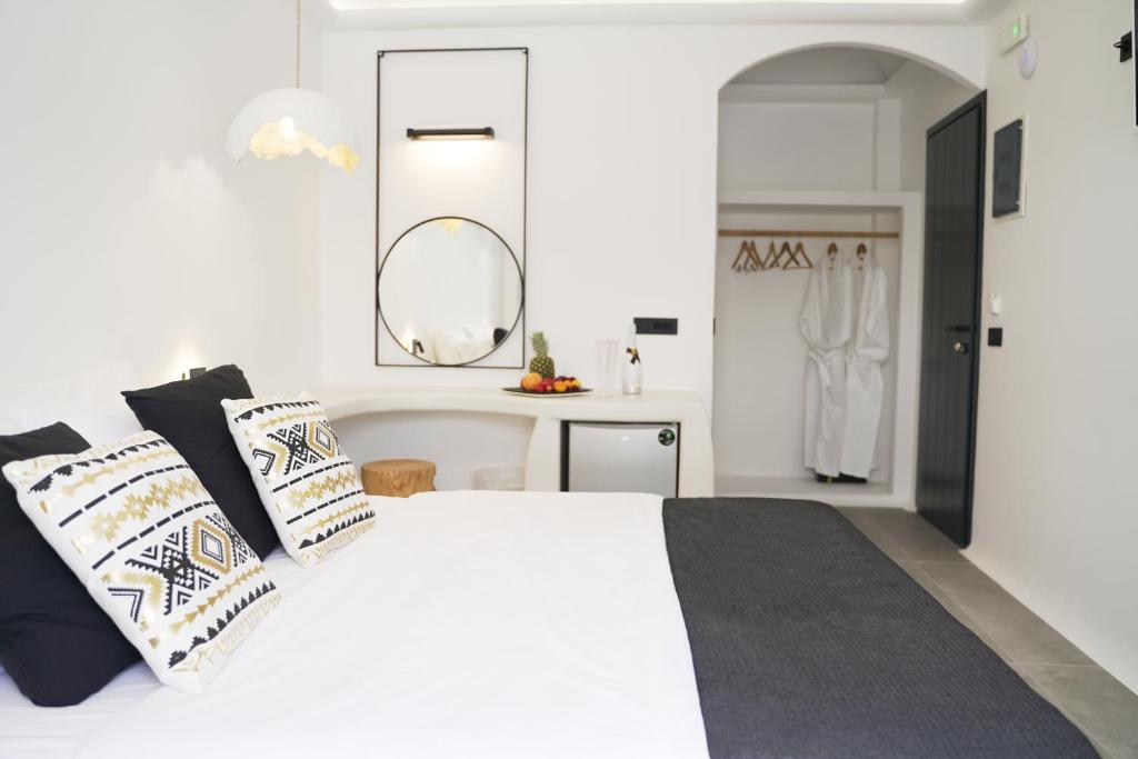 Postel nebo postele na pokoji v ubytování King's Suites