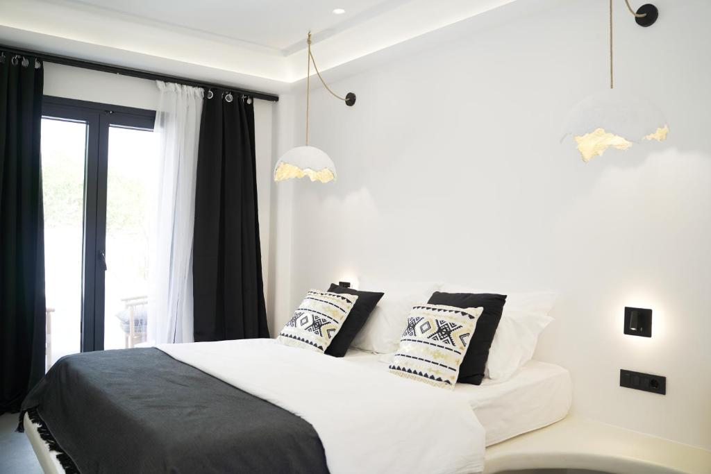 Postel nebo postele na pokoji v ubytování King's Suites