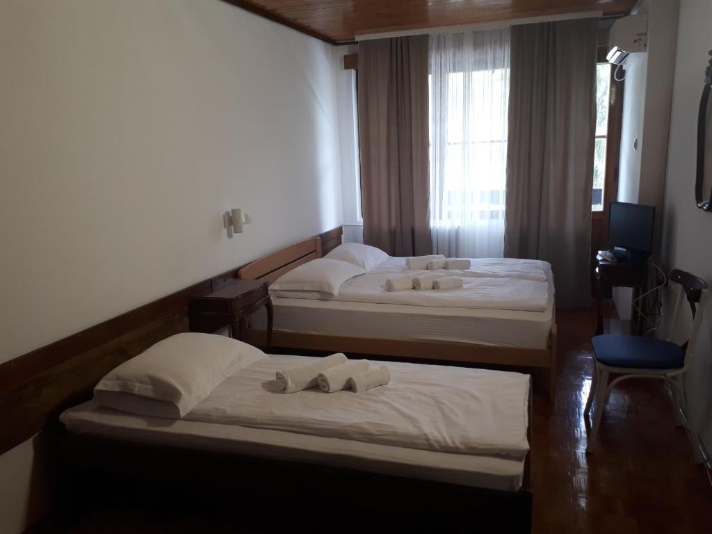 Postel nebo postele na pokoji v ubytování Hotel Trayal