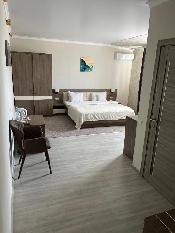 Postel nebo postele na pokoji v ubytování Elite Hotel