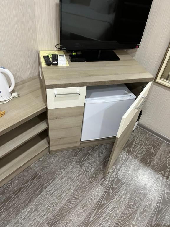 TV a/nebo společenská místnost v ubytování Elite Hotel