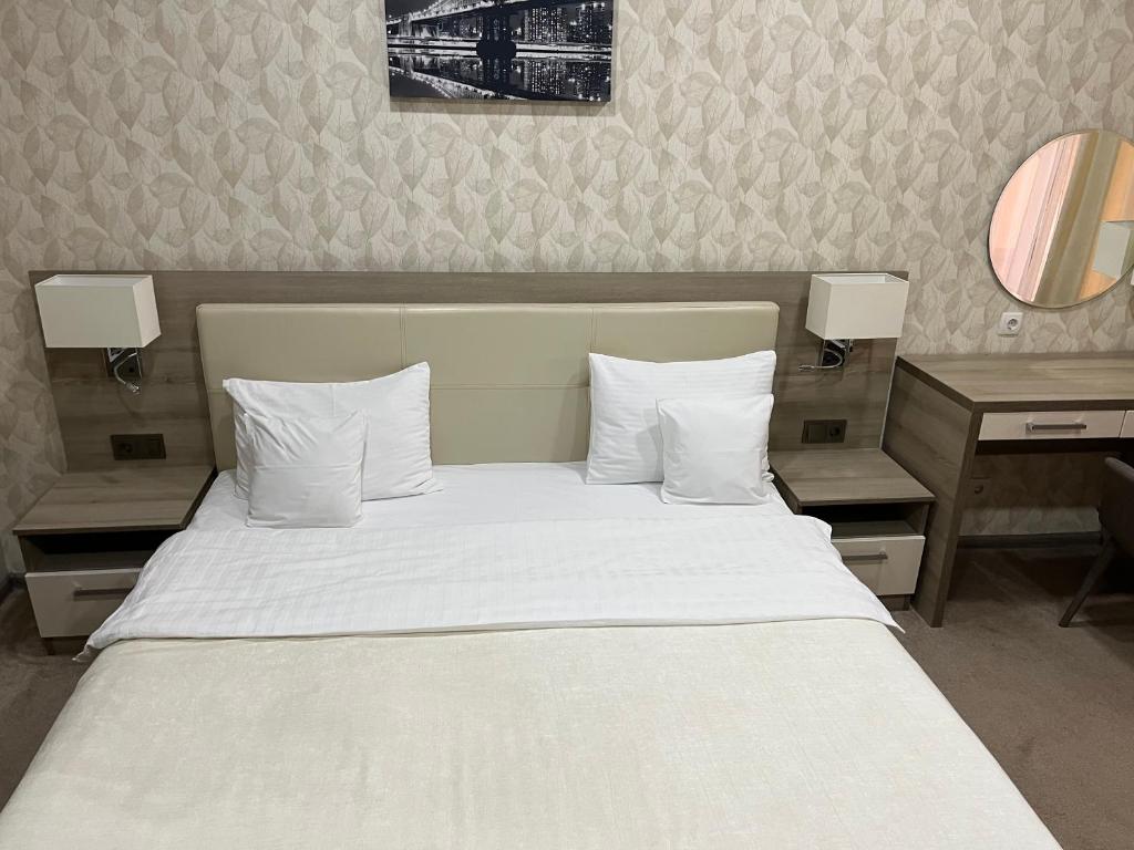 Postel nebo postele na pokoji v ubytování Elite Hotel
