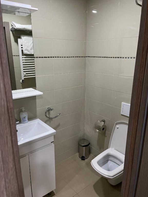 Koupelna v ubytování Elite Hotel