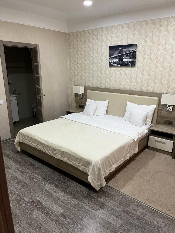 Postel nebo postele na pokoji v ubytování Elite Hotel