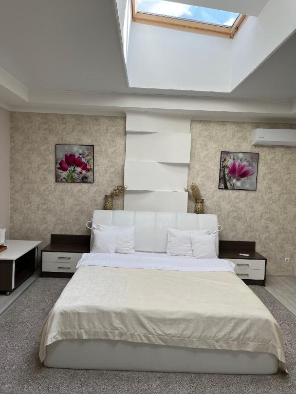 Postel nebo postele na pokoji v ubytování Elite Hotel