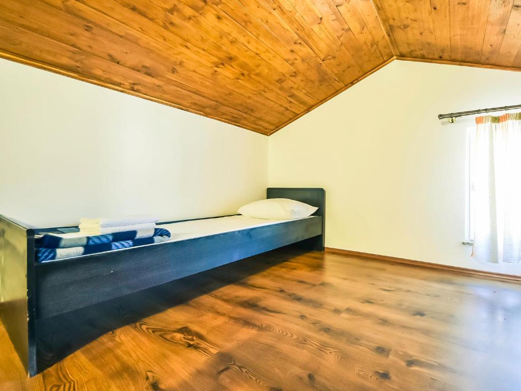 Posteľ alebo postele v izbe v ubytovaní Apartment Anić-4 by Interhome