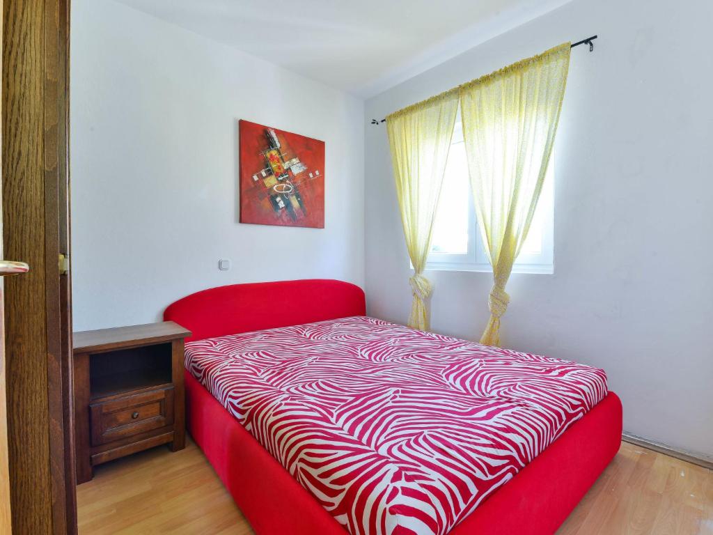 Łóżko lub łóżka w pokoju w obiekcie Apartment Jadran-3 by Interhome