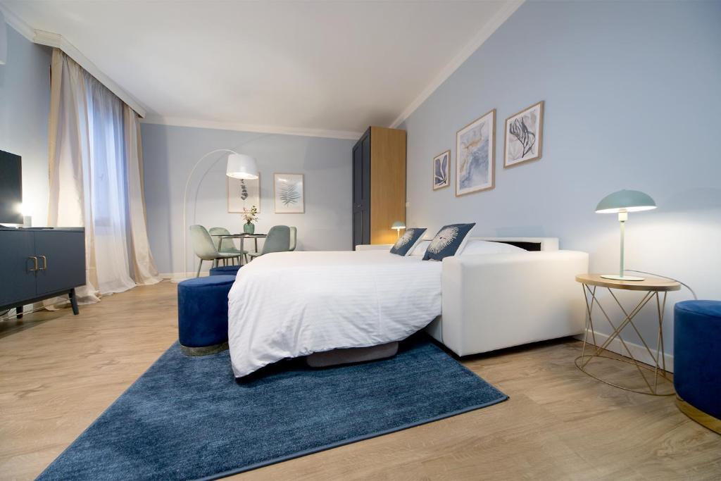 Posteľ alebo postele v izbe v ubytovaní Suite Veronica & Maison Laguna