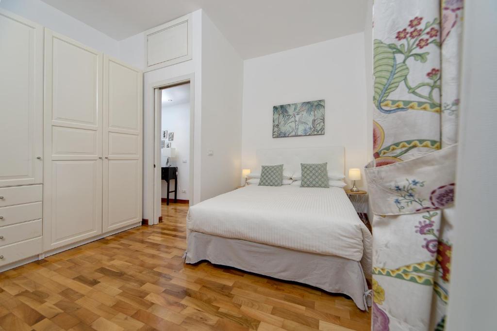 Posteľ alebo postele v izbe v ubytovaní Suite Veronica & Maison Laguna