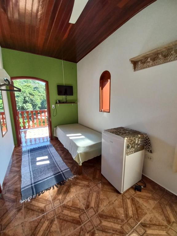 Postel nebo postele na pokoji v ubytování Pousada Canto Verde