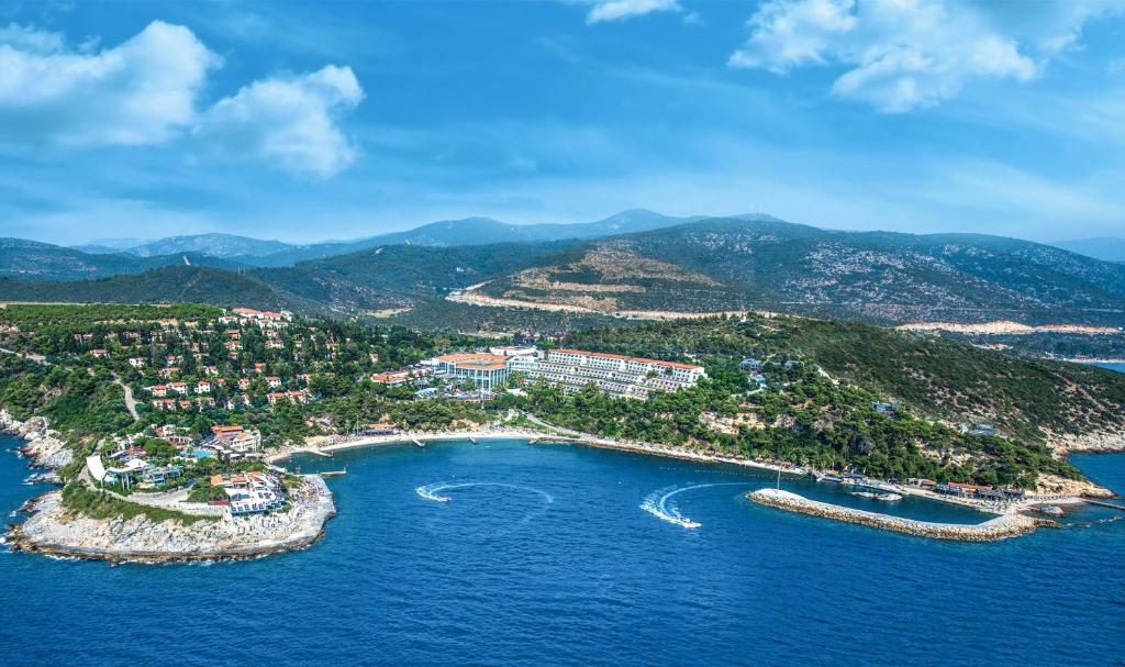 an aerial view of a resort in the ocean at Pine Bay Holiday Resort in Kuşadası