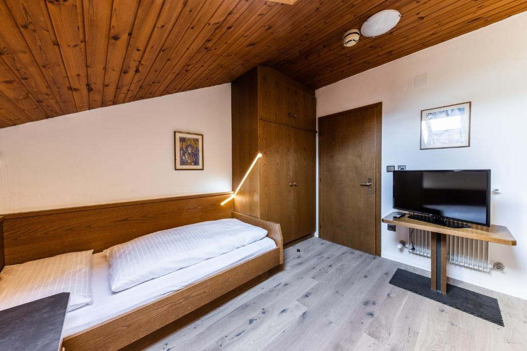 Postel nebo postele na pokoji v ubytování Hotel Fines