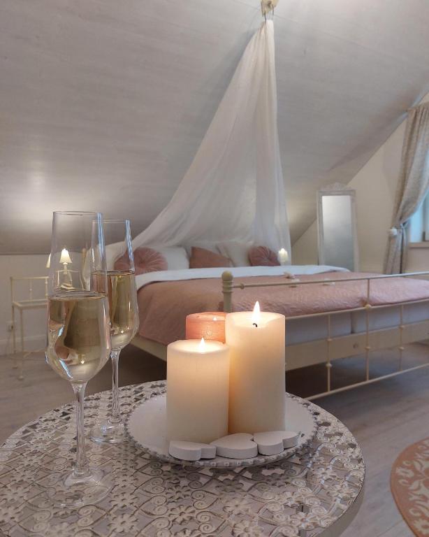 Postel nebo postele na pokoji v ubytování Boutique hotel Soukeníkův dům