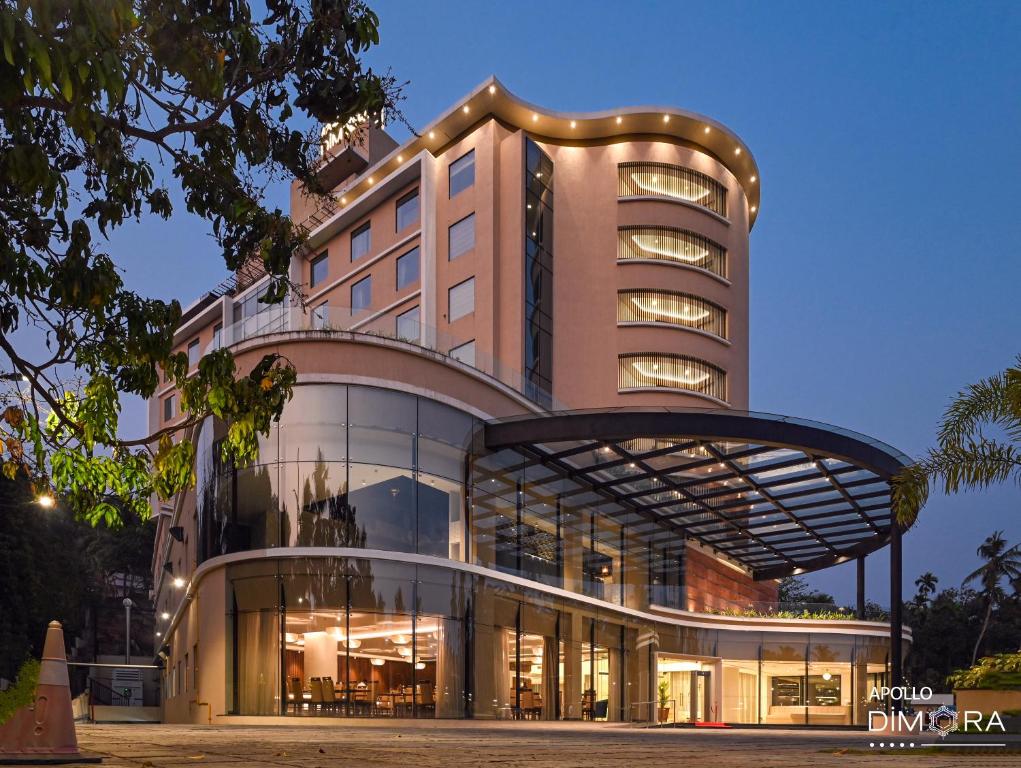 a large building with a lot of windows at Dimora Kozhikode in Kozhikode