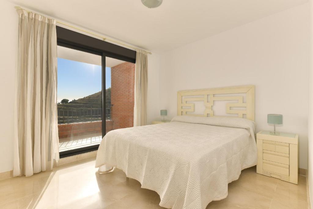 Postel nebo postele na pokoji v ubytování Exclusivo apartamento de 2 dormitorios vista mar lateral
