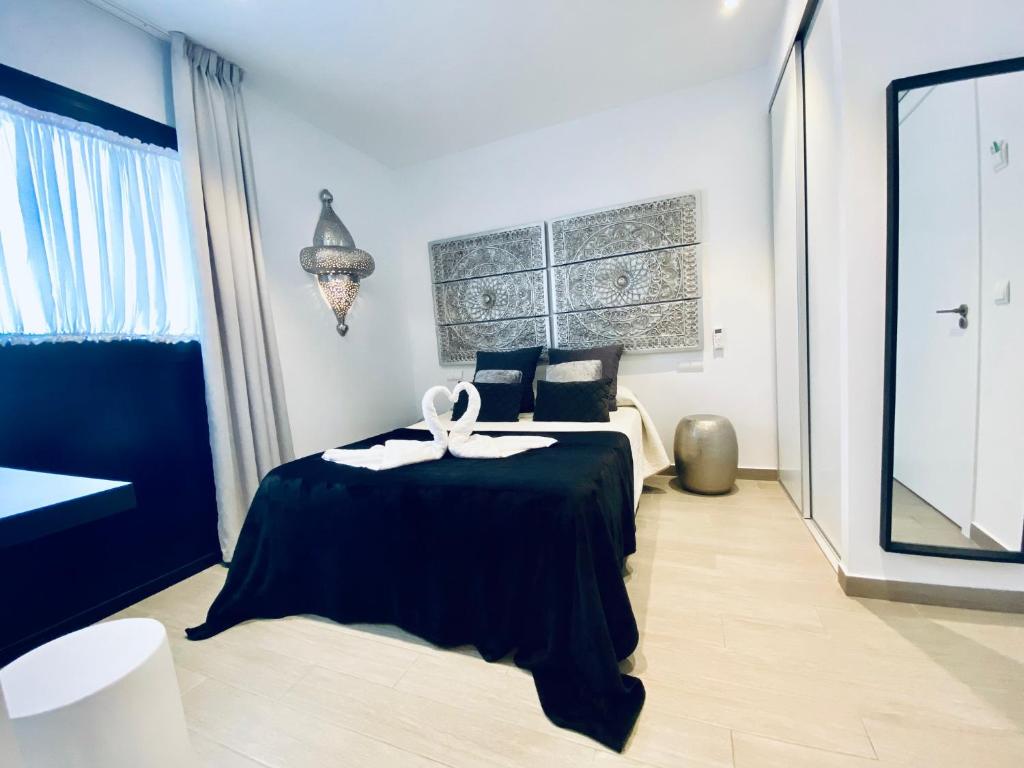 Posteľ alebo postele v izbe v ubytovaní Hostal Alisol Boutique San Pedro