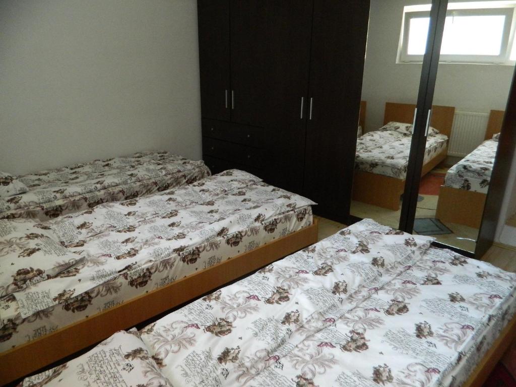 Postel nebo postele na pokoji v ubytování Cazare Vio