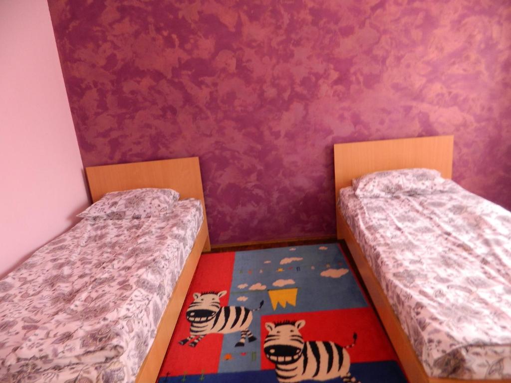 Postel nebo postele na pokoji v ubytování Cazare Vio