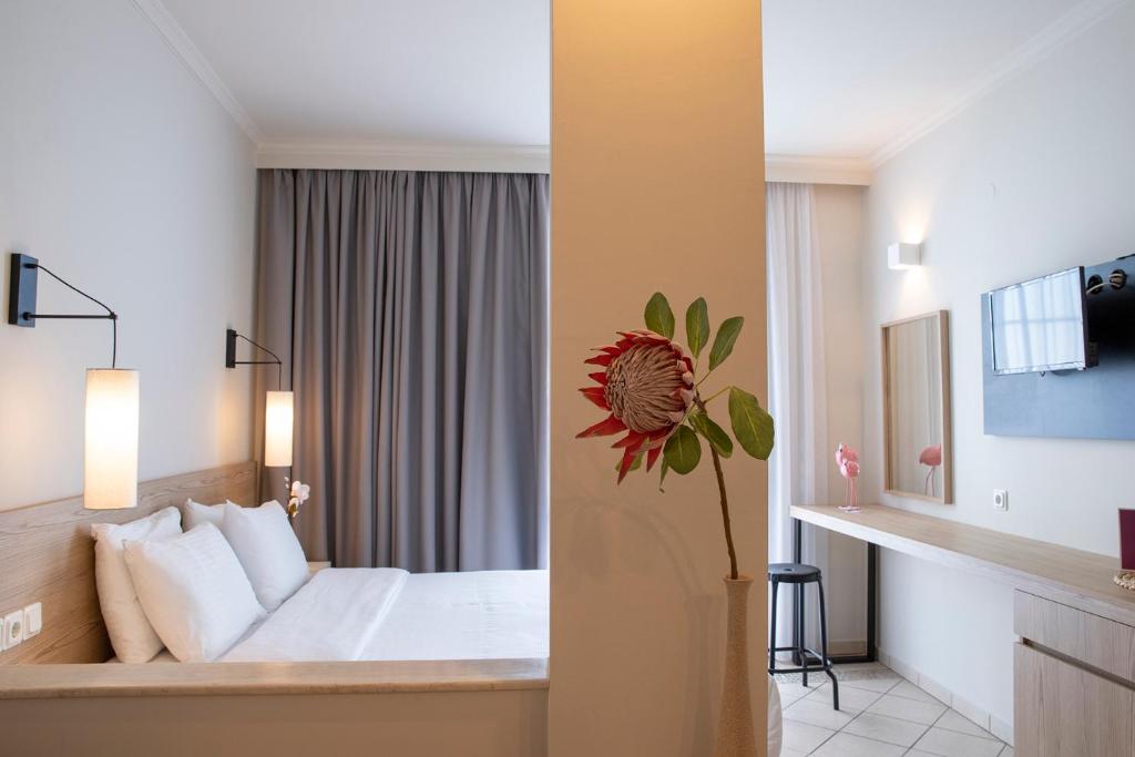 Postel nebo postele na pokoji v ubytování Zefyros Sea View Hotel
