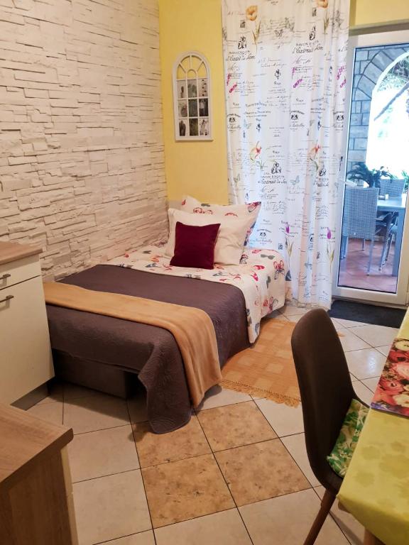 Postel nebo postele na pokoji v ubytování Villa Mateja