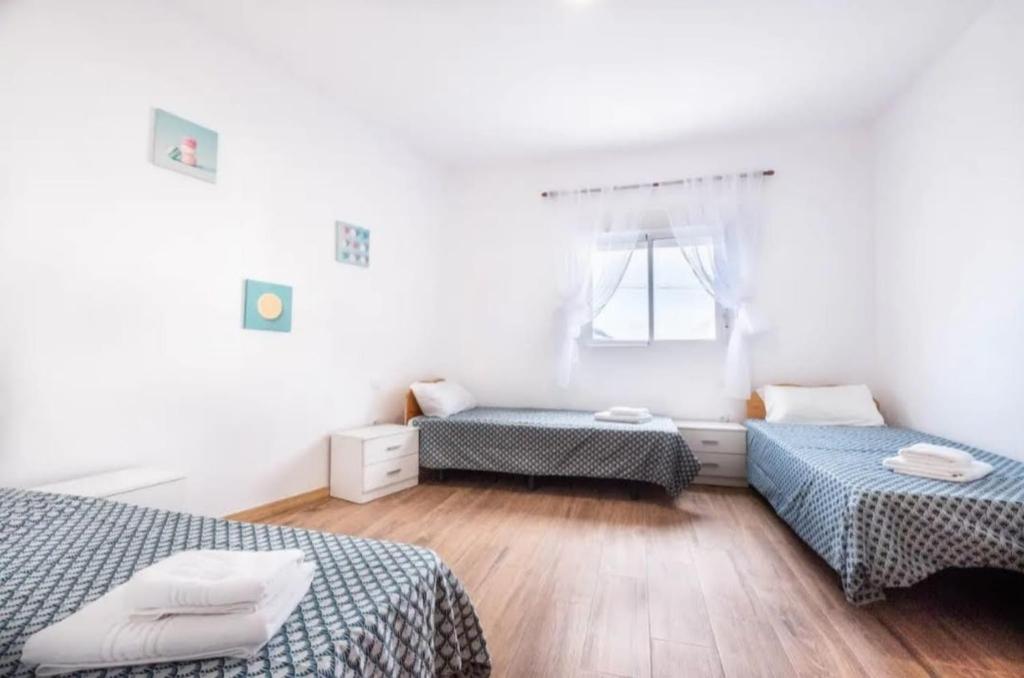 Postel nebo postele na pokoji v ubytování Karin House
