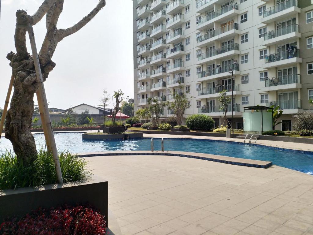 Bazén v ubytování High Livin Apartment Pasteur nebo v jeho okolí