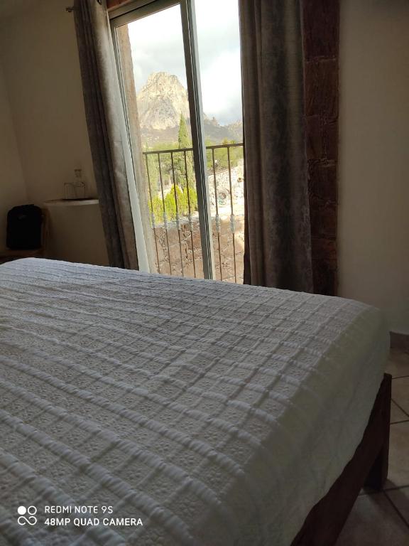 Postel nebo postele na pokoji v ubytování Hotel Beraka