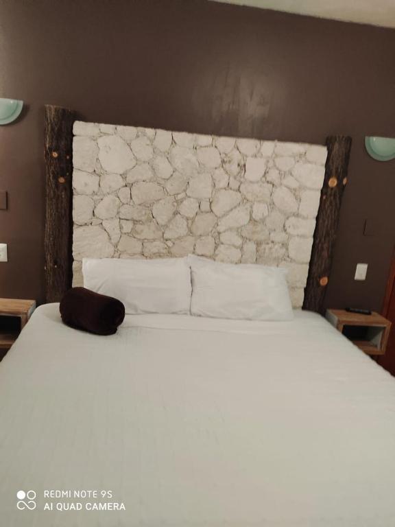 Postel nebo postele na pokoji v ubytování Hotel Beraka