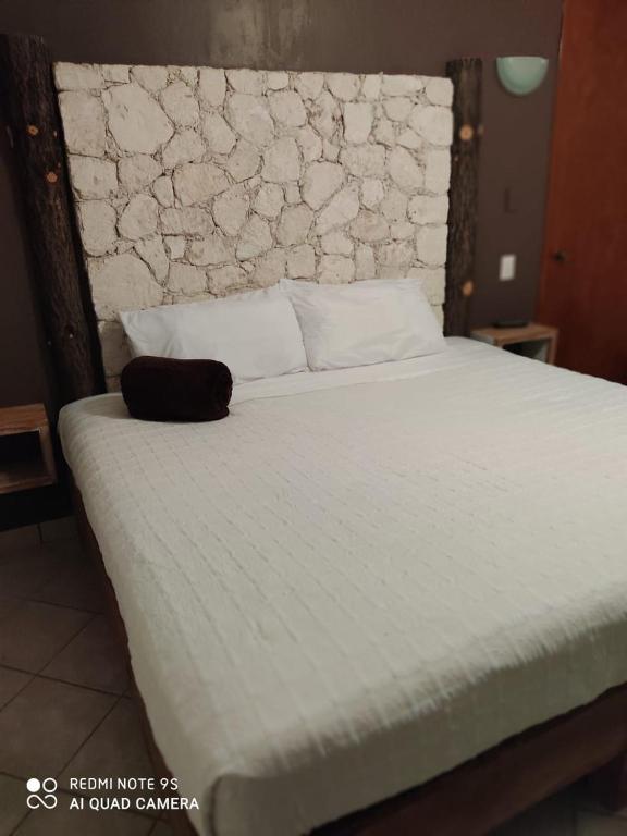 Postel nebo postele na pokoji v ubytování Hotel Beraka