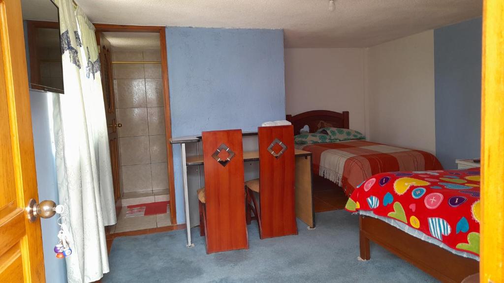 Postel nebo postele na pokoji v ubytování Hospedaje el Motilon